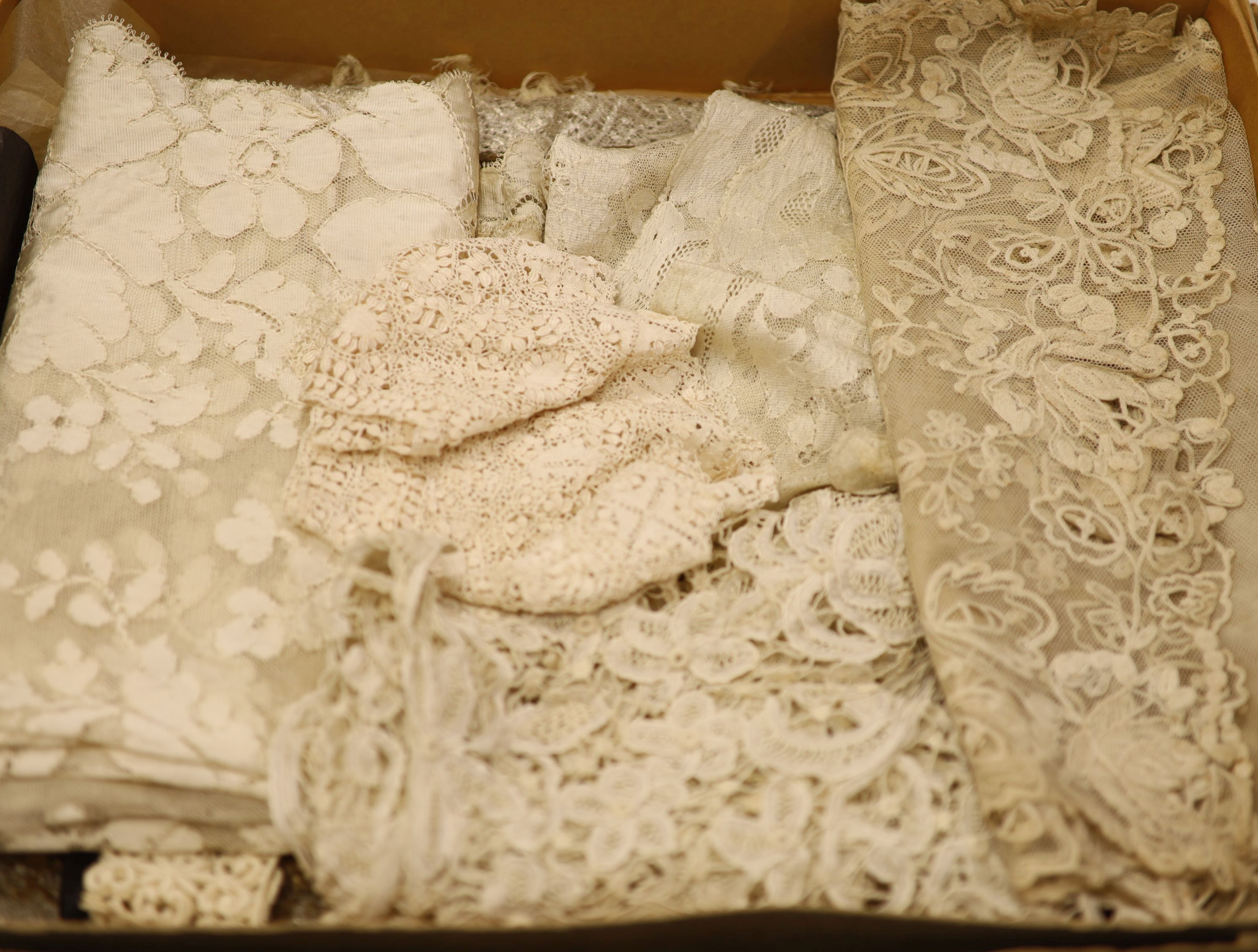A silk lace stole, collar and Maltese collar, christening shawl, tape lace collar, a metallic gold and silver machine lace panel etc